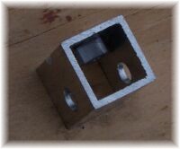 Spacer bracket with nut epoxied inside - Click to enlarge