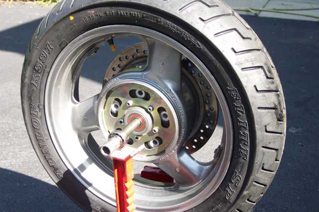 Supporting the wheel using jack stands, axle and wheel bearings